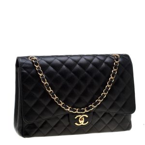 The Chanel Black Quilted Leather Maxi Classic Double Flap Bag